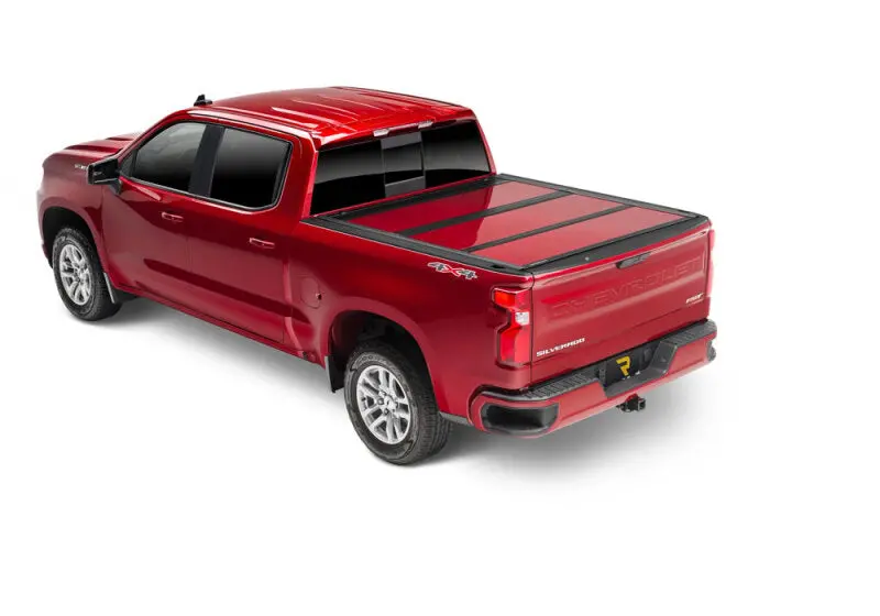Undercover Fusion Retractable Truck Bed Cover For 2009–2018 Dodge Ram – 68.4-Inch Length, Bright Silver Finish 1